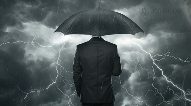 man holding umbrella facing away
